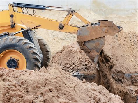 backfilling foundation with skid steer|how to backfill a foundation.